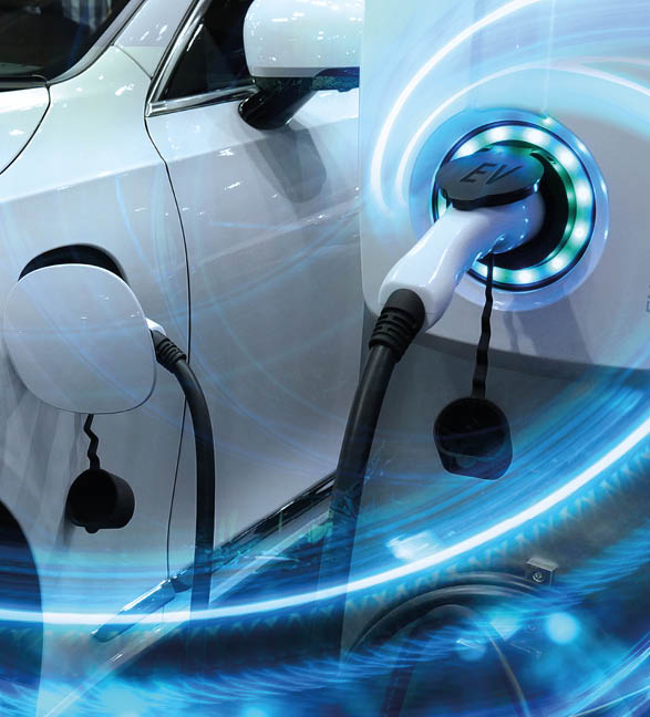 EV Car or Electric vehicle at charging station with the power cable supply plugged in on blurred nature with blue enegy power effect  Eco-friendly sustainable energy concept 