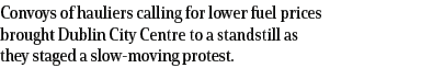 Convoys of hauliers calling for lower fuel prices brought Dublin City Centre to a standstill as they staged a slow-mo   