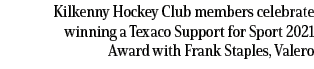 Kilkenny Hockey Club members celebrate winning a Texaco Support for Sport 2021 Award with Frank Staples, Valero