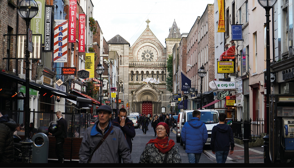 Dublin, Ireland - October 4rd, 2019: Grafton Street, one of the principal shopping streets in Dublin city centre  People walking on a commercial street in Ireland 