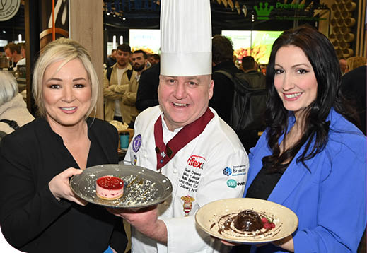 Recipe for Success at IFEX: Thousands attend food, drink, retail, foodservice and hospitality event at TEC Belfast.   First Minister, Michelle O’Neill, and deputy First Minister, Emma Little Pengelly, attended Day Two of the event, and are pictured with Sean Owens, Salon Culinaire Director, IFEX.   IFEX runs until 4pm on Thursday 7th March and visitors can register at www.IFEXexhibition.co.uk   Photo by Simon Graham