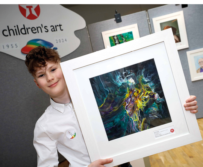 ***FREE TO USE IMAGE - NO REPRODUCTION FEE*** Third prize in Category D of the 2024 Texaco Children's Art Competition was won by Kildare student, Danil Korolko (age 10) from Ch ca Naofa Kilcock, for a work entitled ‘The Big Bang’. Danil is pictured at a function to announce the top winners held in Dublin. Photo Credit (Mac Innes Photography/Justin Mac Innes)