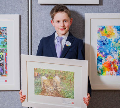 ***FREE TO USE IMAGE - NO REPRODUCTION FEE*** Second prize in Category E of the 2024 Texaco Children's Art Competition was won by Westmeath student, Nicholas Glynn (age 8) from All Saints' National School, Mullingar, for his work entitled ‘Lost Little Lambs (Moate Park, Roscommon)’. Nicolas is pictured with his prize-winning artwork at a function to announce the top winners held in Dublin. Photo Credit (Mac Innes Photography/Peter Houlihan)