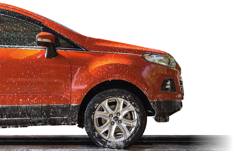 Orange car with white soap on the body in car care shop  Isolated on white background