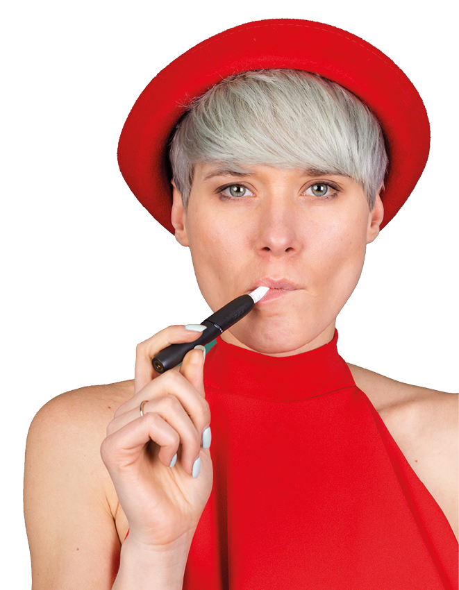 Studio portrait of stylish woman in red dress on green background with electronic cigarette IQOS heat system
