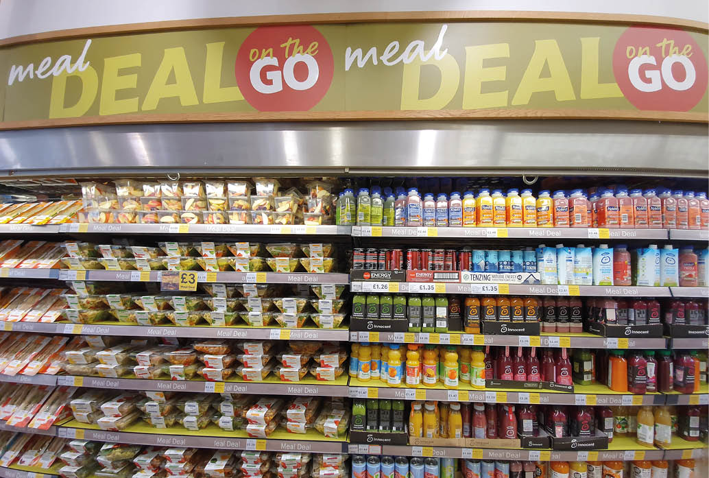 London, United Kingdom - June 08 19: Isle of Tesco supermarket shelves with Meal Deal promotion