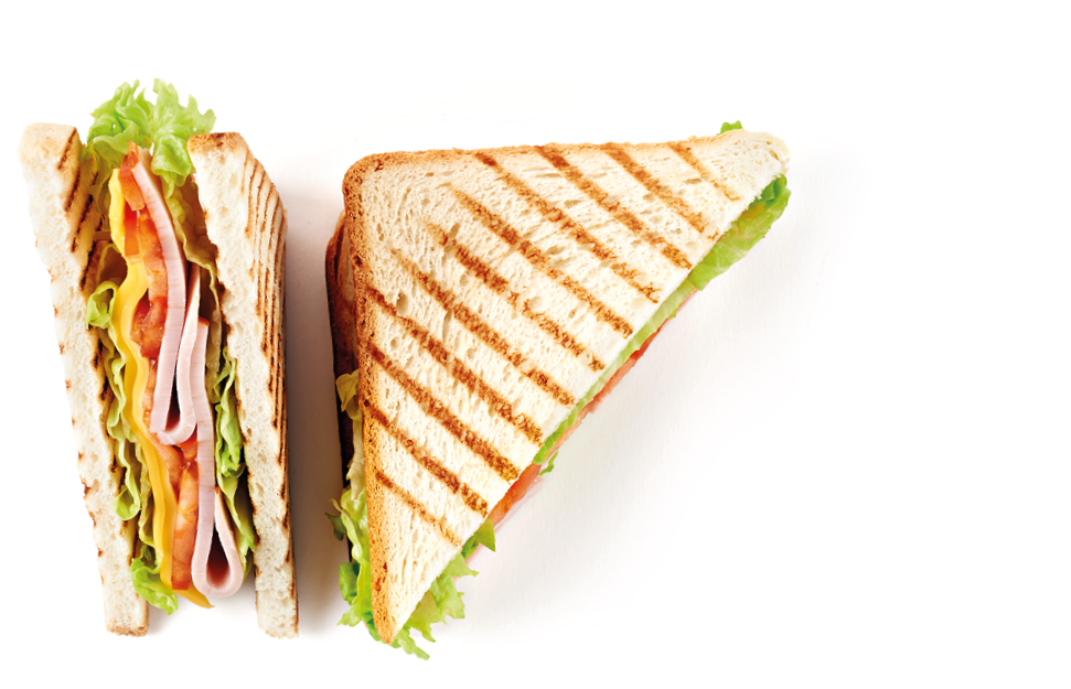 Sandwich with ham, cheese, tomatoes, lettuce, and toasted bread  Top view isolated on white background 