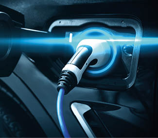 EV charging station for electric car in concept of green energy and eco power produced from sustainable source to supply to charger station in order to reduce CO2 emission .