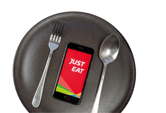 Phitsanulok Thailand - May 29 , 2020 : App Just Eat showing screen with cell phone plate white background.