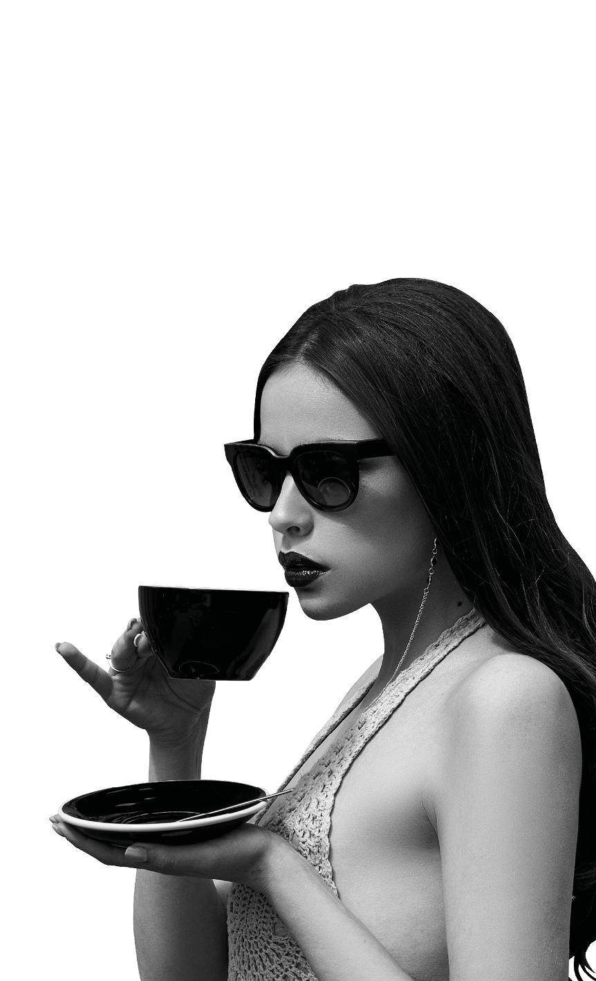Beautiful girl wearing stylish sunglasses and dark berry lipstick having a break. Luxury life of celebrity woman. Fashionable gorgeous looking beautiful girl having cup of coffee