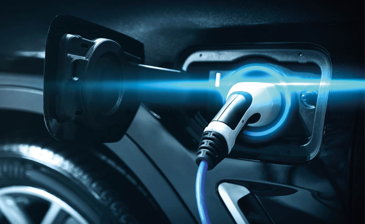 EV charging station for electric car in concept of green energy and eco power produced from sustainable source to supply to charger station in order to reduce CO2 emission .