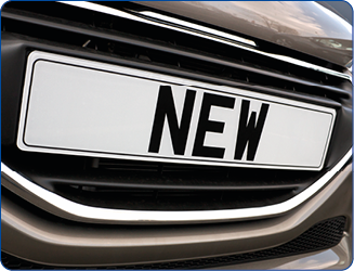 Number plate of a new car for retail sale on a motor dealers forecourt all logos removed