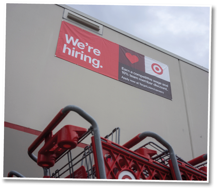 Tigard, OR, USA - Sep 22, 2021:  We're hiring  banner is seen outside a Target store in Tigard, Oregon  A labor shortage has complicated hiring efforts among major retailers toward the holiday season 