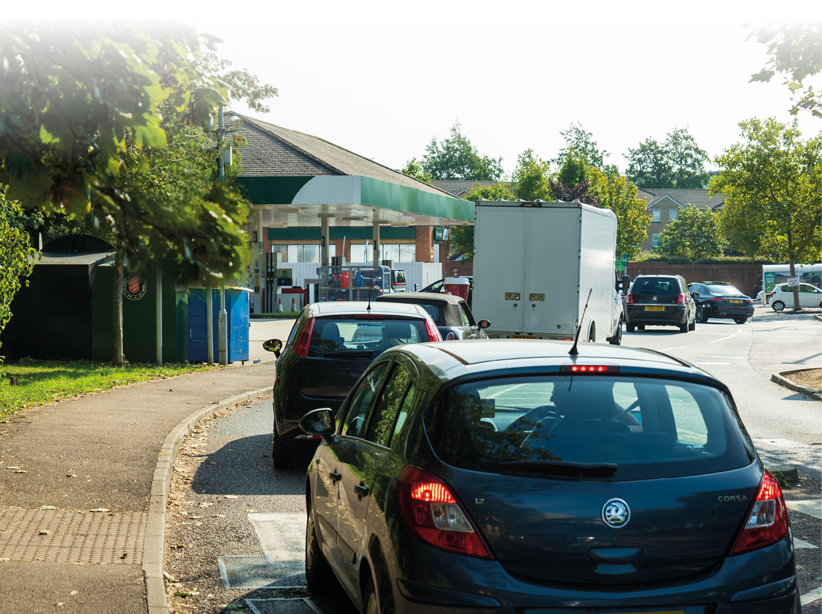 Northampton UK - Sep 26 2021: long car queue at Morrisons petrol station  Petrol and diesel fuel shortages 