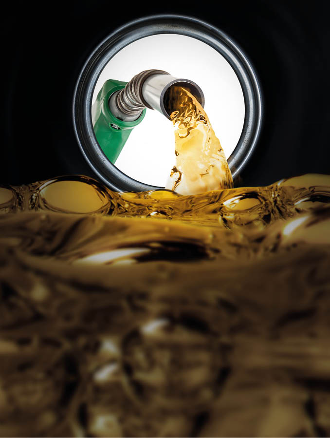 Refilling fuel seen from inside of gas tank of a car