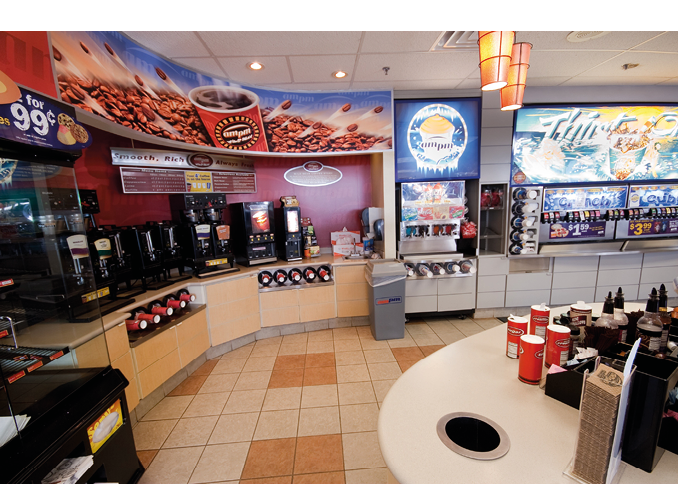 Elk Grove, CA - May 15 2014: Interior of a AMPM convenience store with the coffee and fountain drink dispensers shown.