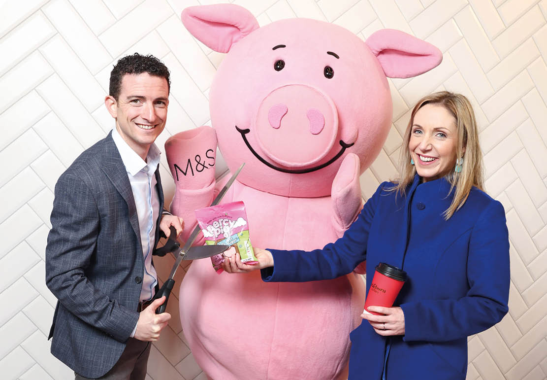 17/11/22 ***NO REPRO FEE*** Eddie Murphy, M&S Trading Director and Fiona Matthews, Applegreen ROI Managing Director pictured with Percy Pig at the Applegreen Mountgorry in Swords Co Dublin, for the launch of the very first M&S Food in store at Applegreen. The exciting partnership is the continuation of Applegreen's commitment to providing the best in store experience and choice to its customers by adding over 400 exclusive M&S food products. The very best of M&S Food; including fresh fruit, sandwiches and salads, dinner for tonight and a selection of other delicious M&S treats including everyone’s favourite, Percy Pigs and Colin the Caterpillar cakes, are now available in store at Applegreen Mountgorry.. Pic: Marc O'Sullivan