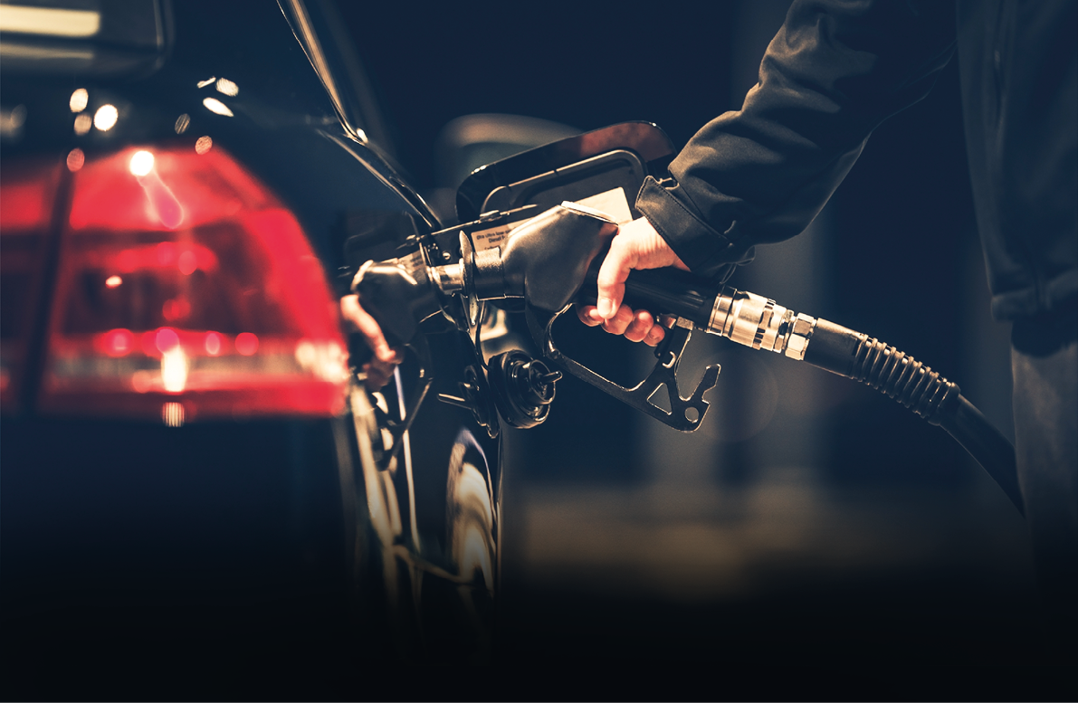 Car Refueling at the Gas Station. Gas Pump Nozzle.