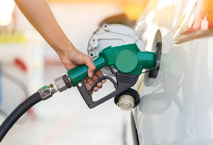 Hand Man Refill and filling Oil Gas Fuel at station. Gas station - refueling. To fill the machine with fuel. Car fill with gasoline at a gas station. Gas station pump. 