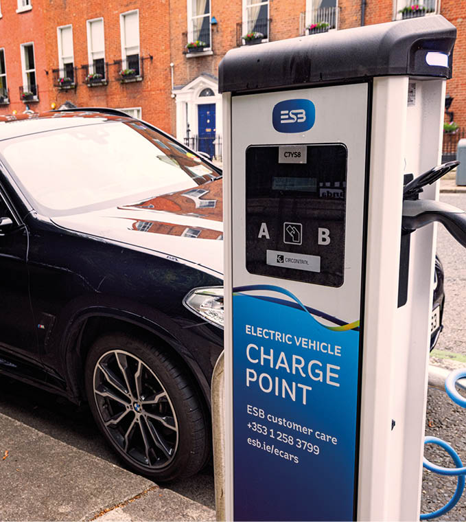 Dublin, Ireland, 16 6 2021 Electric Vehicle 'EV' charging electric power in battery at public charge point  Ecars operates and maintains 1,200 public charge points ESB (Electricity Supply Board) 