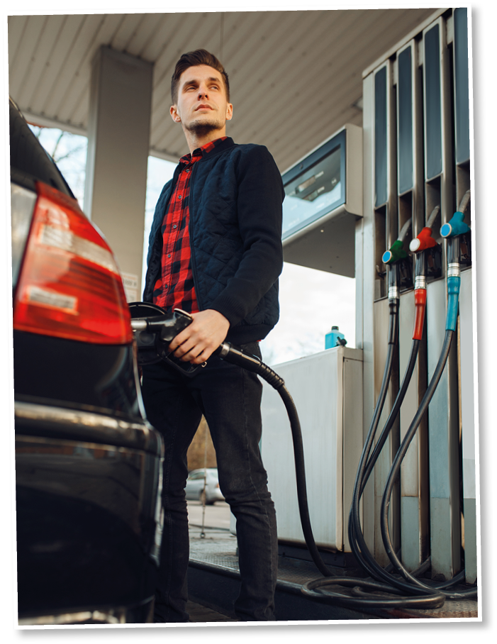 Man fuels vehicle on gas station, bottom view