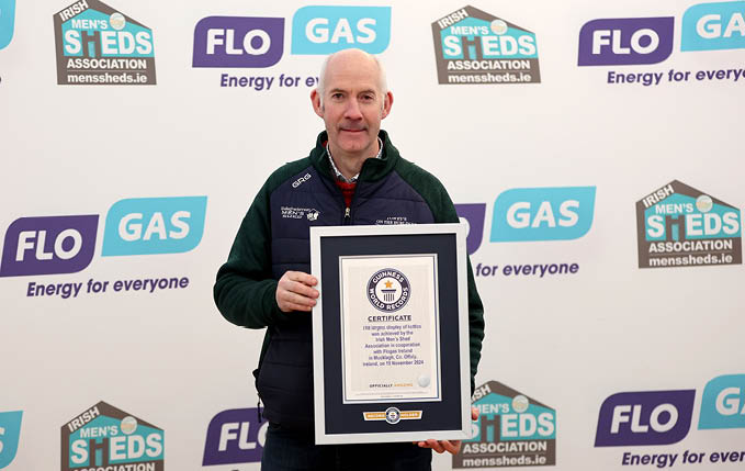  Pat Towey, Ballaghaderreen Men's Shed at the news that The Irish Men’s Shed Association sponsored by Flogas Achieve Official Guinness World Record for the Largest Display of Kettles 19/11/2024 The Irish Men’s Shed Association, sponsored by energy company Flogas, have successfully achieved the official Guinness World Record for the Largest Display of Kettles. Kettles are the most important tool in supporting social connection and mental wellbeing for ‘Shedders’. Over one thousand new and old kettles in working order collected from Sheds nationwide and donated by Flogas were on display at the Association’s annual conference and shedfest in Mucklagh Community Centre, Tullamore, Co. Offaly on Tuesday 19th November 2024. The official Guinness World Record certificate for the Largest Display of Kettles was presented by adjudicator Seyda Subasi Gemici to Irish Men's Sheds members Mandatory Credit ©INPHO/James Crombie