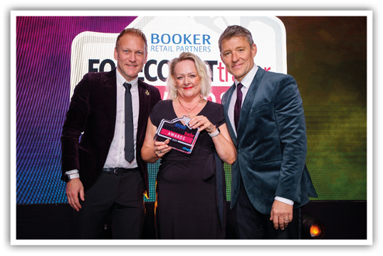 A group of people posing for a photo Description automatically generated