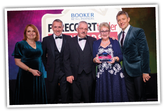 A group of people posing for a photo Description automatically generated