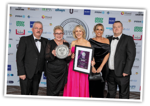 A group of people posing for a photo Description automatically generated