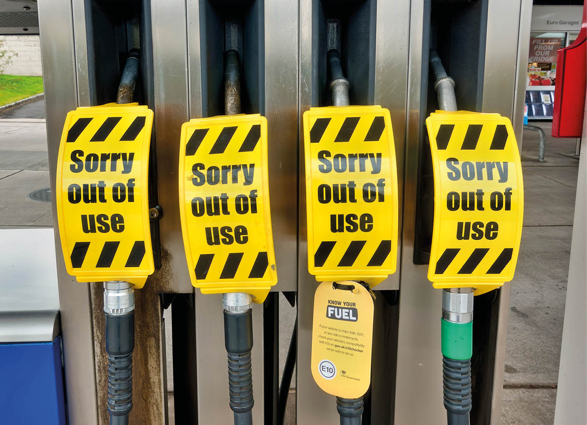 Warminster,Wiltshire,UK - 28 September 2021: An ESSO petrol station pump with no fuel and a sign that limits motorists to a maximum fill of £30 due to a shortage of fuel tanker drivers               