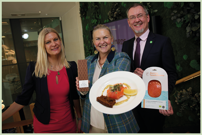 Business / News 17102024 Bord Bia’s National Organic Awards. Pictured are Minister of State, Pippa Hackett, Birgitta Hedin-Curtin, Burren Smokehouse with Jim O’Toole, CEO Bord Bia, at Bord Bia’s National Organic Awards which took place today at an awards ceremony this morning in the Bord Bia Global Hub, Dublin. Burren Smokehouse was announced as the winner of Best Irish Organic Product. For more information visit bordbia.ie Photo : Chris Bellew / Fennell Photography