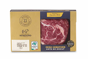 A packaged cut of Irish Hereford prime beef ribeye steak labeled as matured for 21 days for tenderness with quality and taste certifications. Description generated by AI