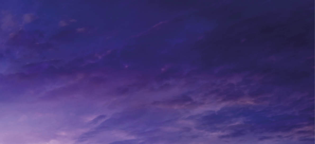 Petrol gas station at night with city building 