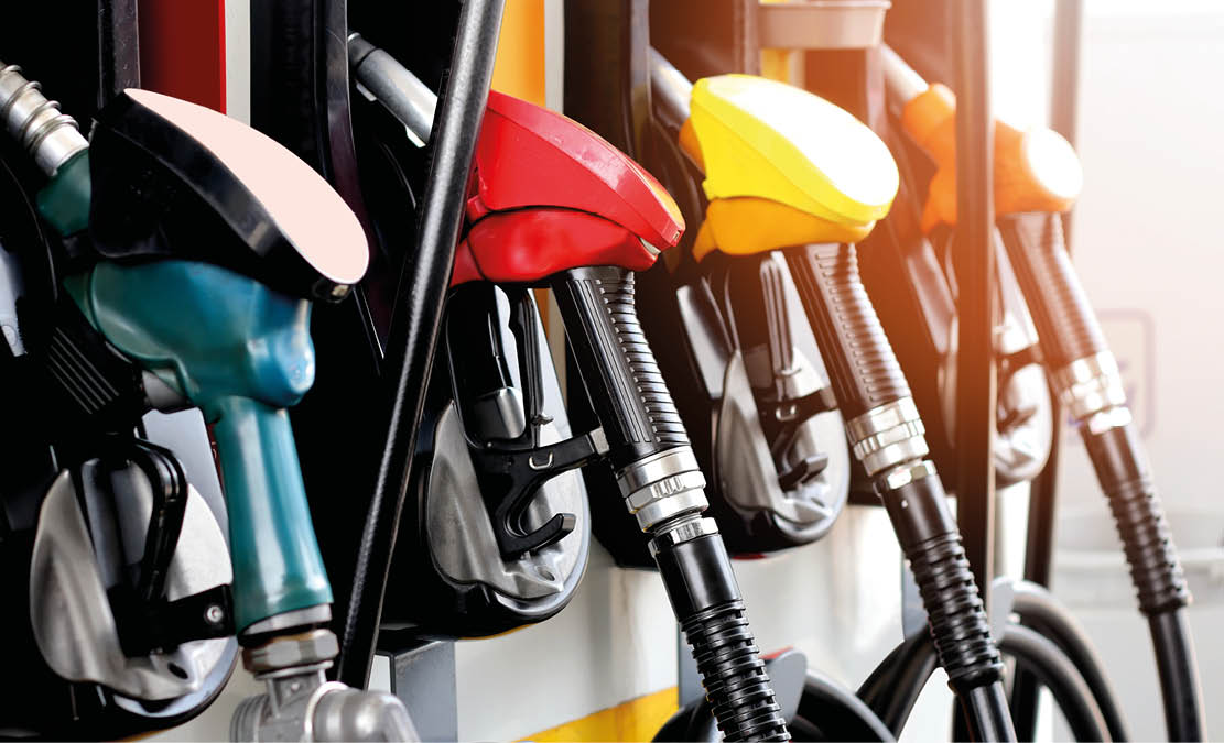 red green yellow orange color fuel gasoline dispenser background