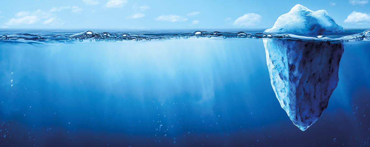 Panoramic View Of Iceberg In Cold Blue Waters - Risk And Hidden Danger Concept