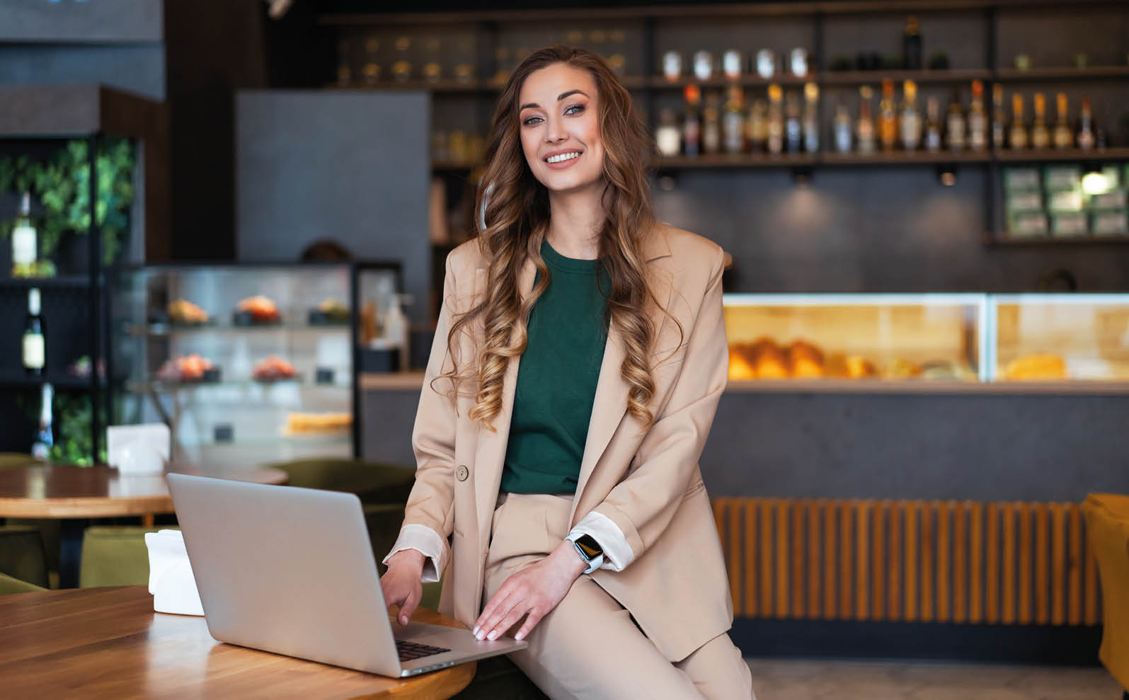 Business Woman Restaurant Owner Use Laptop In Hands Dressed Elegant Pantsuit Sitting On Table In Restaurant With Bar Counter Background Caucasian Female Business Person Indoor