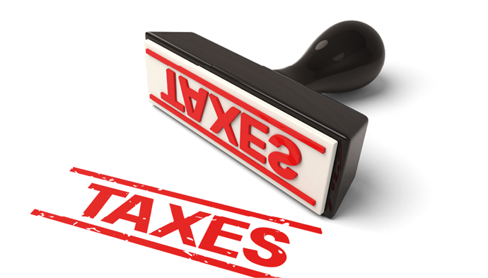 A rubber stamp with taxes in red ink.3d image. Isolated white background.