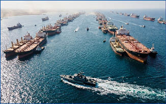 A large body of water with many boats and a small boat in the foreground. Description generated by AI