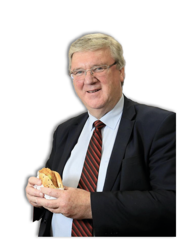 A man wearing a suit and tie is holding a sandwich. AI generated content