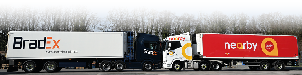 Two trucks are parked next to each other, one is white and the other is red. AI generated content