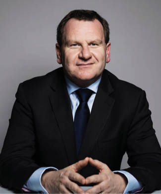 A man wearing a suit and tie. Description generated by AI