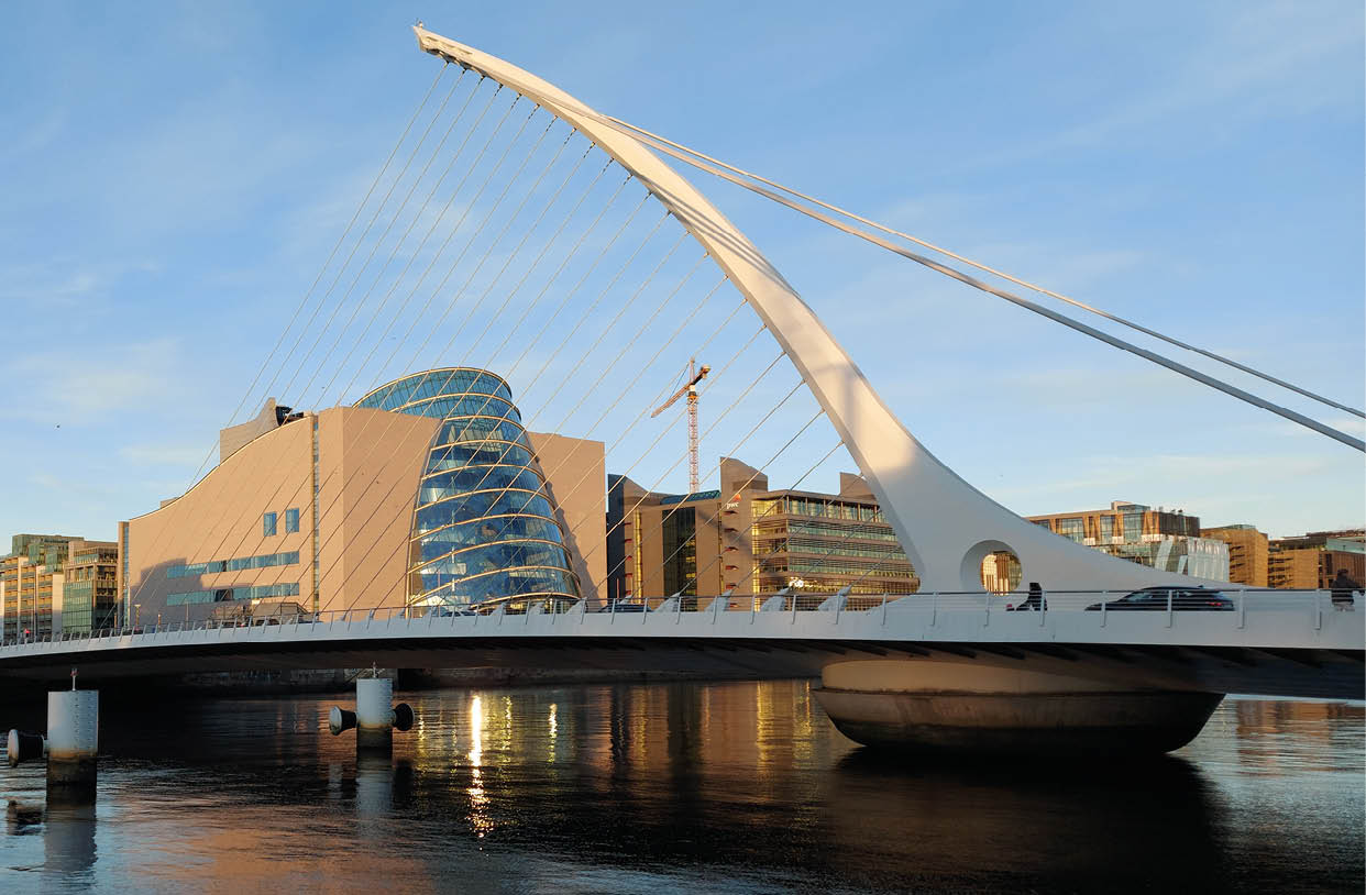 A bridge over a body of water. Description generated by AI
