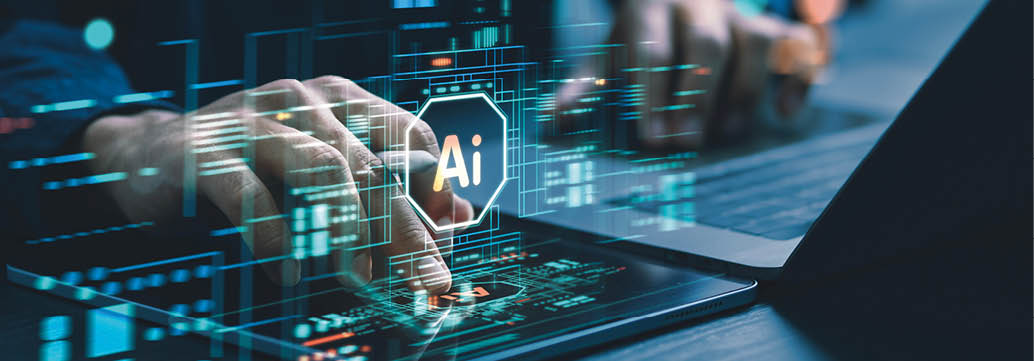 A person is typing on a laptop with a graphic of an AI on the screen. Description generated by AI