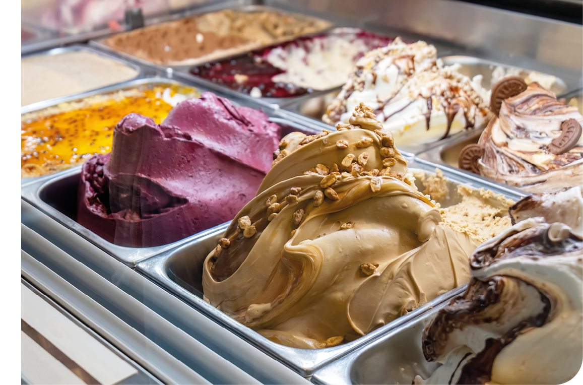 A display case with various ice cream flavors. Description generated by AI