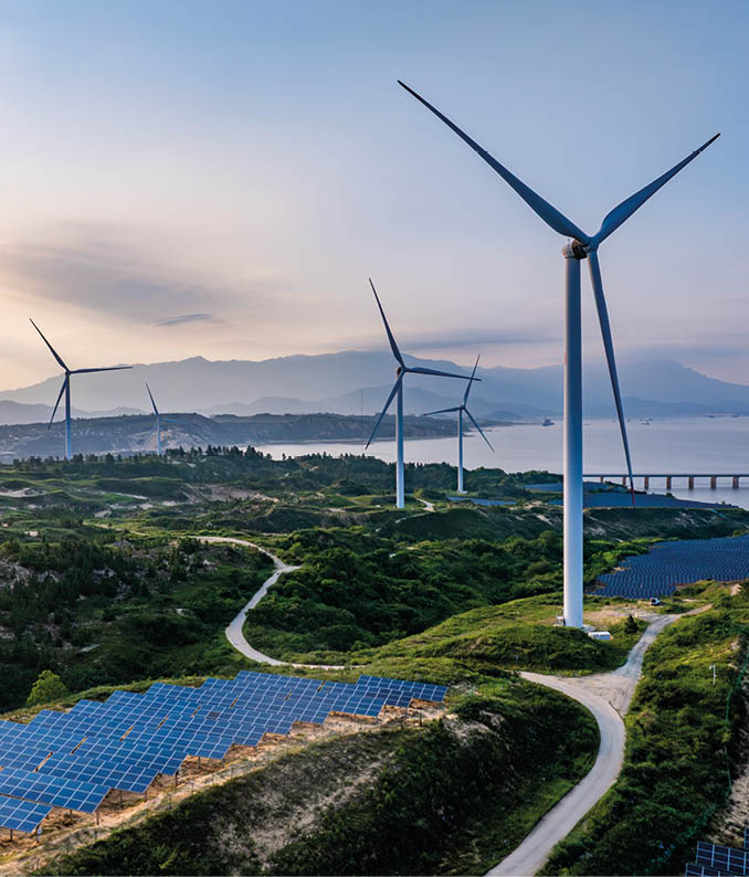 A wind farm with four wind turbines. Description generated by AI