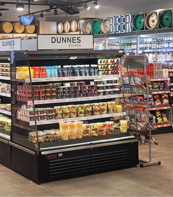 A store with a lot of food and drinks. Description generated by AI