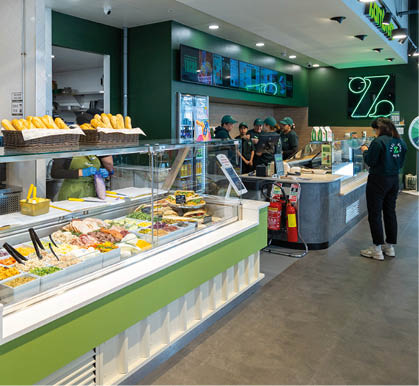 A restaurant with a green counter. Description generated by AI