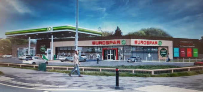 A man walking in front of a gas station. Description generated by AI