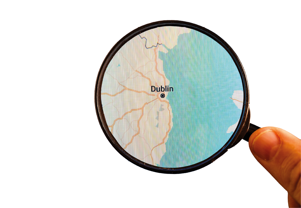 Dublin, Ireland. Political map. City visualization illustrative concept on display screen through magnifying glass in the hand.