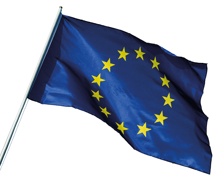 European Union EU flag waving in the wind over cloudy blue sky low angle view close up.